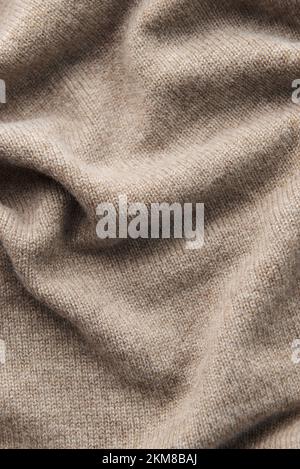 Fine grey cashmere texture close-up. Warm cashmere fabric as background, top view Stock Photo