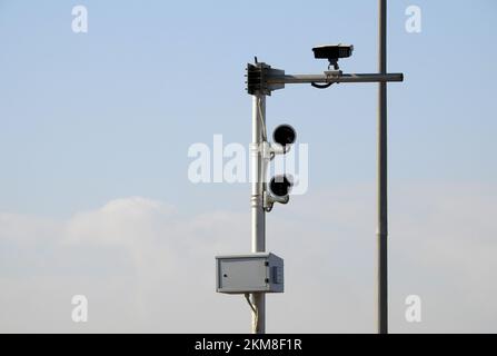 A roadside speed safety camera for supervision of the highways to detect and record the vehicles on the roads and the authority can catch the above sp Stock Photo