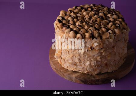 Close-up photo of a cake on a wooden board Stock Photo