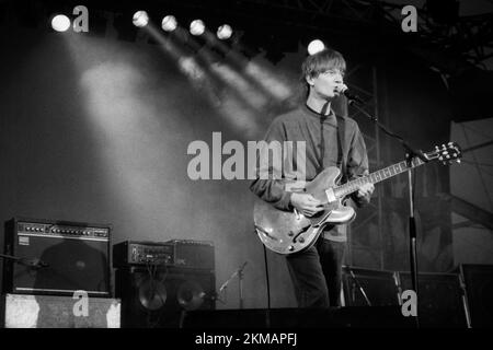 The House of Love live in concert in France in the 1990s - Guy Chadwick, on stage with his band The House of Love in 1992 at the Tamaris Rock Festival, France Stock Photo