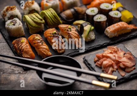 Japanese food concept. Sushi set menu on vintage background Stock Photo