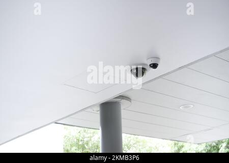 Modern CCTV camera on a wall Stock Photo