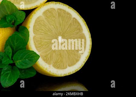 Still life, lemon and lime on black background Stock Photo