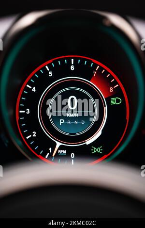 AS vertical closeup of an Aston Martin Vantage digital gauge cluster on track mode Stock Photo