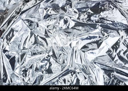 Silver gray crumpled background, metallic. Texture gray silver metallic background. Blank blank mockup. Copy space Stock Photo