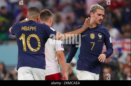 France's Kylian Mbappe and France's Antoine Griezmann pictured during a soccer game between France and Denmark, in Group D of the FIFA 2022 World Cup, at the Stadium 974, in Doha, State of Qatar on Saturday 26 November 2022. BELGA PHOTO VIRGINIE LEFOUR Stock Photo