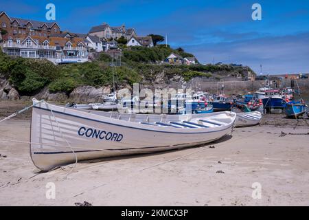 Newquay rowing boat named Concord in Newquay Harbour, Cornwall, UK Stock Photo