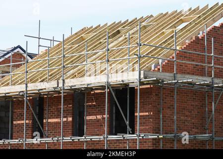 New roof construction at housebuilding site, timber structure of a new build house, London England United Kingdom UK Stock Photo