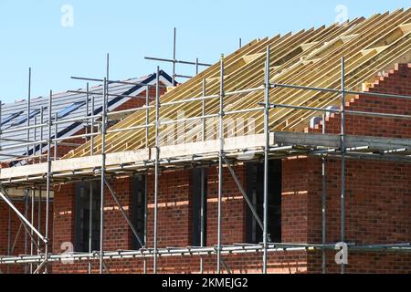 New roof construction at housebuilding site, timber structure of a new build house, London England United Kingdom UK Stock Photo