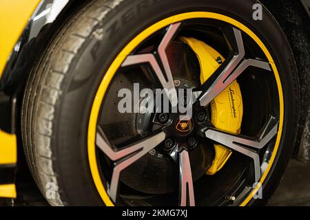 Ternopil, Ukraine- November 11, 2022:  Car wheel of yellow Lamborghini Urus. Stock Photo