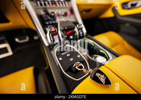 Ternopil, Ukraine- November 11, 2022:  Key inside yellow Lamborghini Urus. Stock Photo