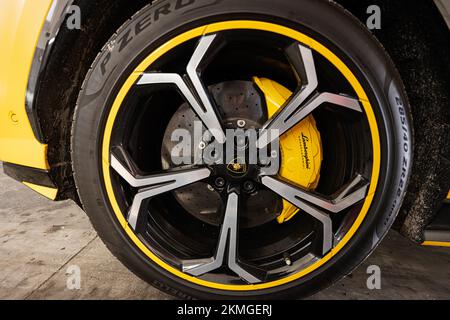 Ternopil, Ukraine- November 11, 2022:  Car wheel of yellow Lamborghini Urus. Stock Photo