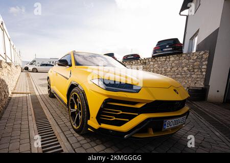 Ternopil, Ukraine- November 11, 2022:  Yellow Lamborghini Urus. Stock Photo