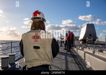 221125-N-TC847-1016 IONIAN SEA (Nov. 25, 2022) Hospital Corpsman 3rd Class Gwendolyn Juel, assigned to the Ticonderoga-class guided-missile cruiser USS Leyte Gulf (CG 55), stands watch on the fo’c’sle during a replenishment-at-sea, Nov. 25, 2022. The George H.W. Bush Carrier Strike Group is on a scheduled deployment in the U.S. Naval Forces Europe area of operations, employed by U.S. Sixth Fleet to defend U.S., allied and partner interests. (U.S. Navy photo by Mass Communication Specialist 2nd Class Christine Montgomery) Stock Photo