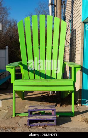Large wooden chair in downtown North Utica, Illinois. Stock Photo