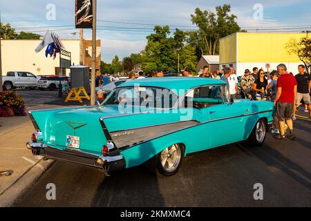 An iconic blue 1957 Chevrolet Bel-Air coupe is parked at a car show in downtown Auburn, Indiana, USA. Stock Photo