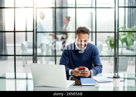 business man reading correspondence on his smartphone. Stock Photo