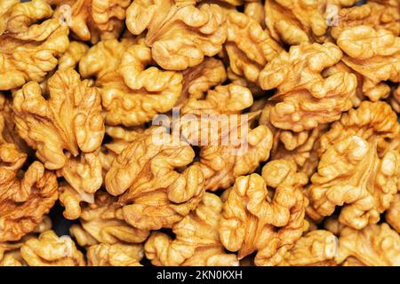 Walnuts background. Kernels walnuts. Top view. Vegetarian or healthy food Stock Photo
