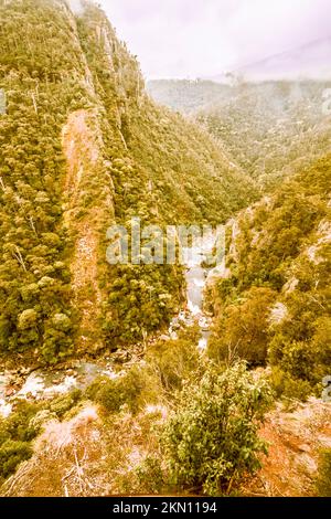 Natural scene of canyon wilderness with an elevated view on bending rivers and steep mountain ranges. Edge Lookout, Leven Canyon Reserve, Tasmania, Au Stock Photo