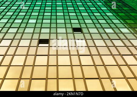 Glass facade of an office tower with two open windows, view upwards, colour gradient green yellow, symbol image ventilation, ventilation, open, backgr Stock Photo