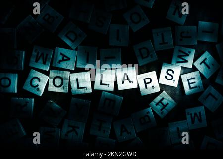 Gamed out word play in financial cataclysm with collapse highlighted from dark depression Stock Photo