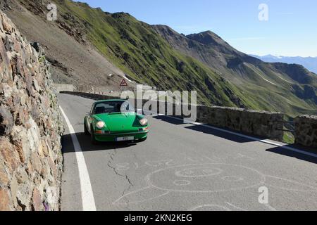 Oldtimer Classic Car historic sports car Porsche 911 2, 7 27 RS driving on the pass of Stilfser Joch Stelvio, Stilfs, Autonomous Province of Bolzano, Stock Photo