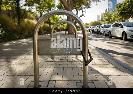 public bicycle parking rack in the city Stock Photo