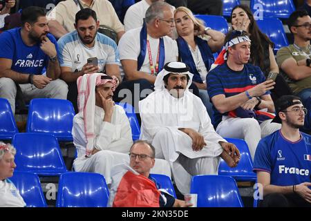 two Qataris sit in their traditional robes in the stands among French fans, football fans. Game 23, Group D France (FRA) - Denmark (DEN) 2-1 on November 26th, 2022, Stadium 974 Football World Cup 20122 in Qatar from November 20th. - 18.12.2022 ? Stock Photo