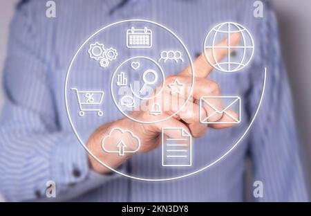 Virtual life, information technology, online services concept. Hand with swirl flow of data, apps, internet shopping, cloud, mail, document. High quality photo Stock Photo