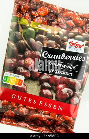 Hamburg, Germany - November 27  2022: Cranberries getrocknet mit Verpackung und Nutri-Score C      -  Dried cranberries with packaging and Nutri-Score Stock Photo