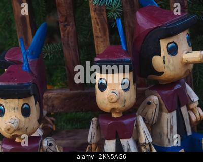 Wooden cute pinocchio puppet toy Stock Photo