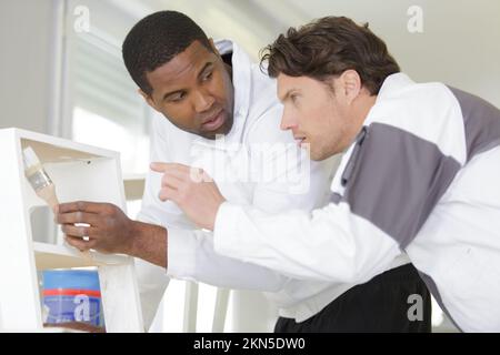 young apprentice painter in professional training Stock Photo