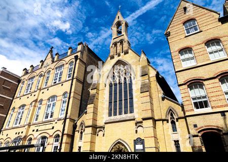 Exterior of 19th century St Monica's Roman Catholic Church designde by E W Pugin in Hoxton Square, Hackney, London, UK Stock Photo