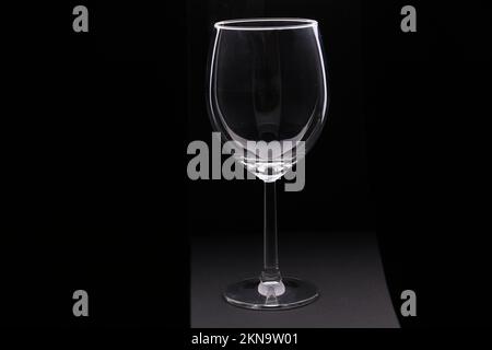 photo of an empty wine glass on a black background Stock Photo