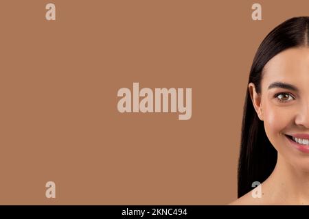 Half of a beautiful young woman's face with perfect skin Stock Photo
