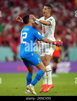 Morocco goalkeeper Munir Mohand Mohamedi and Jawad El Yamiq celebrate their side's second goal of the game during the FIFA World Cup Group F match at the Al Thumama Stadium, Doha, Qatar. Picture date: Sunday November 27, 2022. Stock Photo