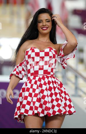 A Croatia supporter and model Ivana Knoll in the stands before the FIFA