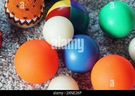 Colorful different juggling balls on a carpet Stock Photo