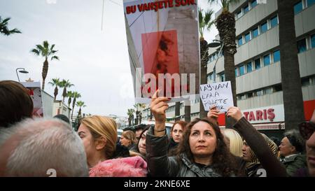 Izmir, Turkey. 27th Nov, 2022. Animal lovers and activists who came together with the call of the Animal Rights Federation in Izmir, protested the animal massacres in Turkey. Video footage that contains graphic image of an officer worker in an animal shelter belonging to Konya Metropolitan Municipality, torturing and killing a dog in the shelter, appeared on social media on November 24 and caused reactions all over Turkey. An investigation was launched after the footage that caused indignation. Two people were detained and arrested as a result of the investigation. Credit: İdil Toffolo/Ģ����ý L Stock Photo