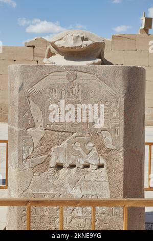 A Stone Scarab Beetle and Stele Near Karnak's Sacred Lake Stock Photo