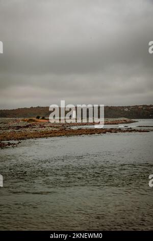 view of Maugers Beach Lighthouse from the beach on McNabs Island halifax nova scotia canada Stock Photo