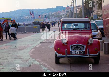A Red Citroen on the boardwalk in Nice, France Stock Photo