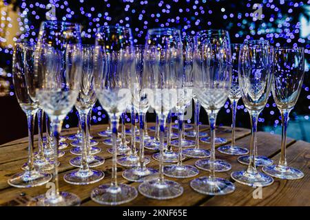 Champagne glasses in preparation for festive season. Stock Photo