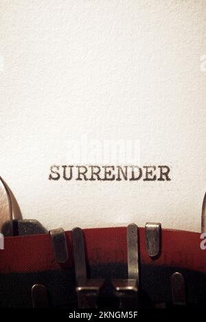 Surrender text written with a typewriter. Stock Photo