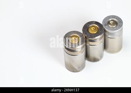Vareity of used ammunition shells isolated on white background Stock Photo