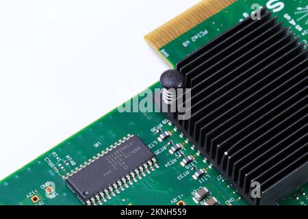 Black Aluminum heatsink on electronics or computer circuit board, Close up. Stock Photo