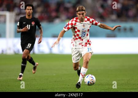 Doha, Qatar. 27th Nov, 2022. DOHA, QATAR - NOVEMBER 27: Borna Sosa in action during the FIFA World Cup Qatar 2022 Group F match between Croatia and Canada at Khalifa International Stadium on November 27, 2022 in Doha, Qatar. Photo: Igor Kralj/PIXSELL Credit: Pixsell photo & video agency/Alamy Live News Stock Photo