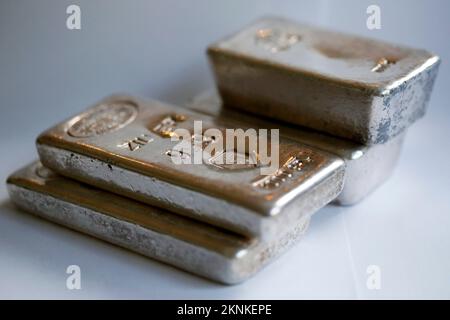 Silver ingots and a grey colored background Stock Photo