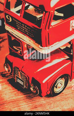 Old-fashioned still-life photo on the details of a touristic double decker bus. Retro red Britain Stock Photo