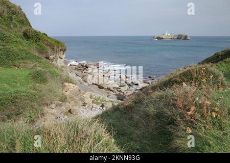 Santander, Spain - 31 Oct, 2022: Faro de la Isla de Mouro from the Magdalena Peninsula, Santander, Cantabria Stock Photo